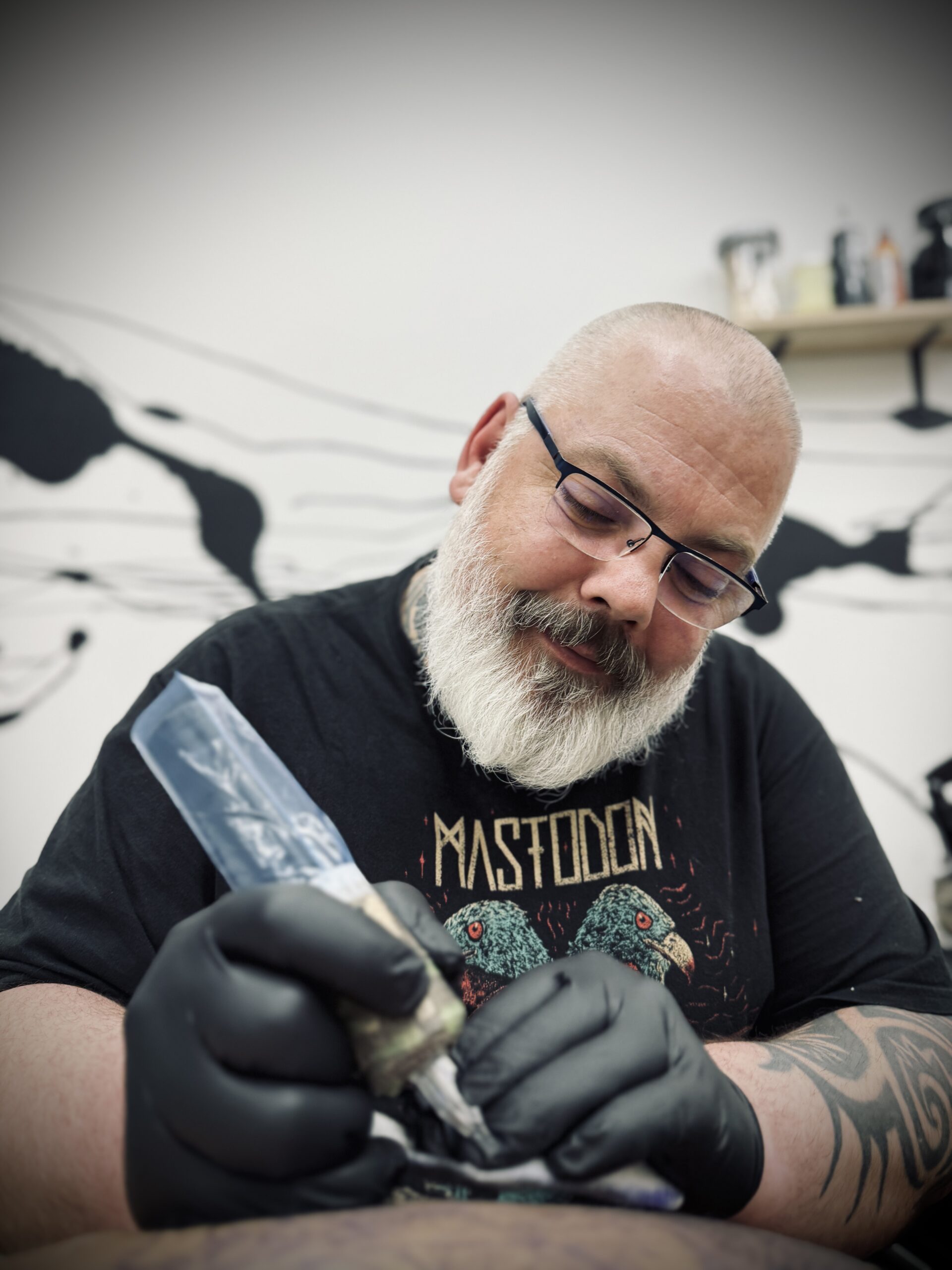 Mr Rzymski tattooing at the studio